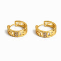 Gold plated Greek key huggie hoop earrings with cubic zirconia accent, 1.8 cm diameter, 6 mm width.
